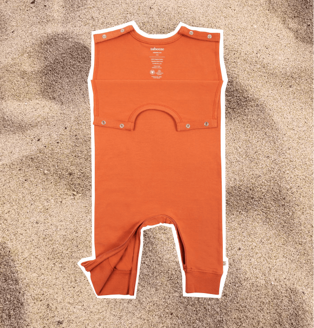 zippy-leg-romper-in-orange-with-ankle-to-ankle-zipper-and-shoulder-snaps-for-easy-changes.